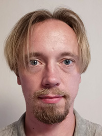 Porträttbild på Andreas Dahlin.