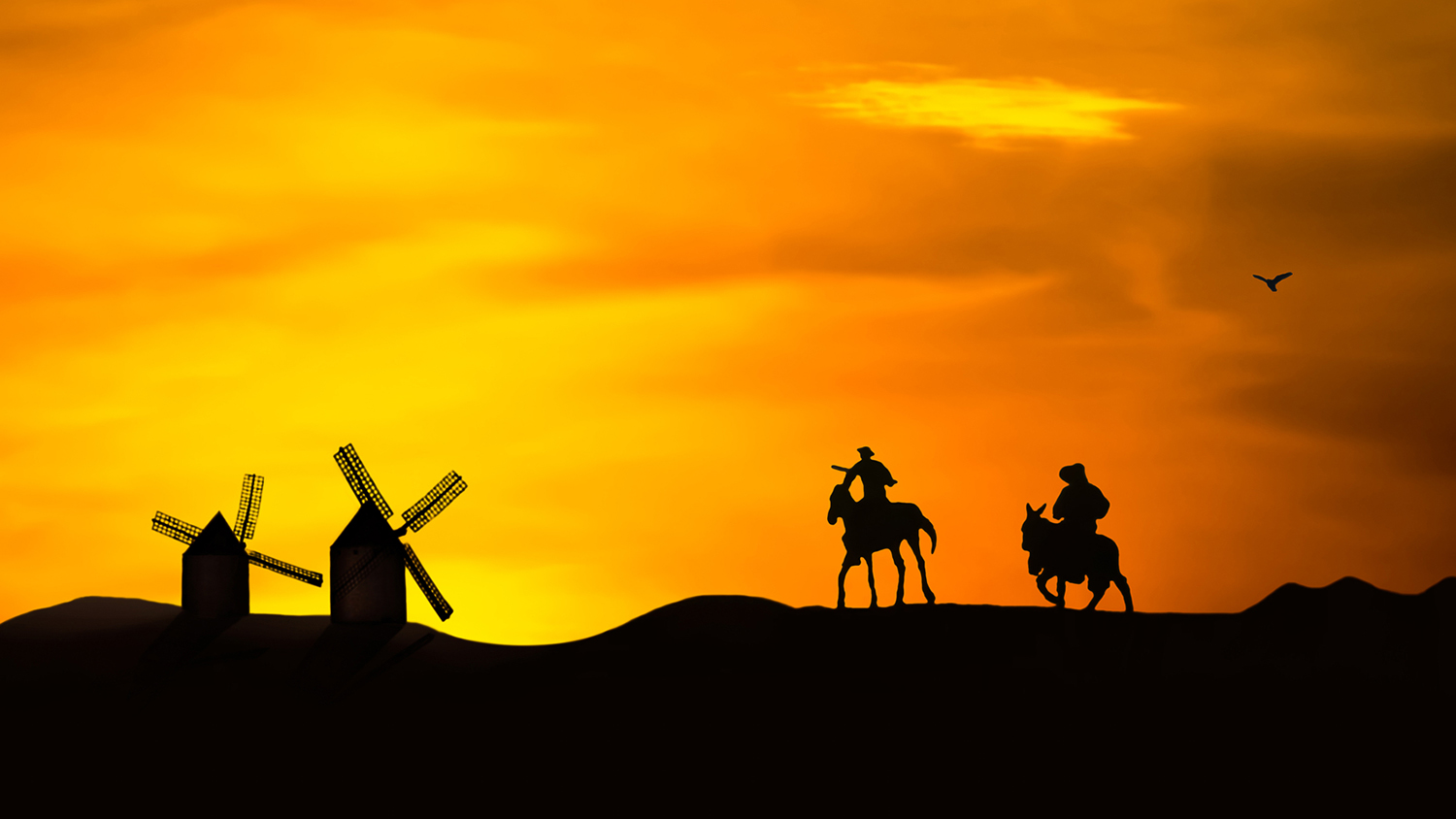 Målning av Don Quixote och Sancho Panza som rider mot väderkvarnar i solnedgången.